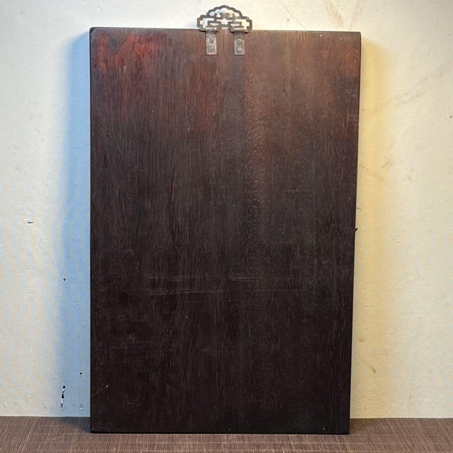 Striking vintage rectangular wall plaque crafted from solid zitan wood. The panel features a vibrant mother-of-pearl...