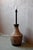 Imposing and organic, this floor lamp evokes the ceramic adventure of West Germany in the 1970s. Its stoneware body takes...