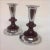 We love how a sculptural walnut spindle breaks up the glam, chrome portion of these tapered candlestick holders. A note...