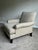 An exceptionally refined pair of Baker Furniture lounge chairs showcasing timeless transitional design, generous...
