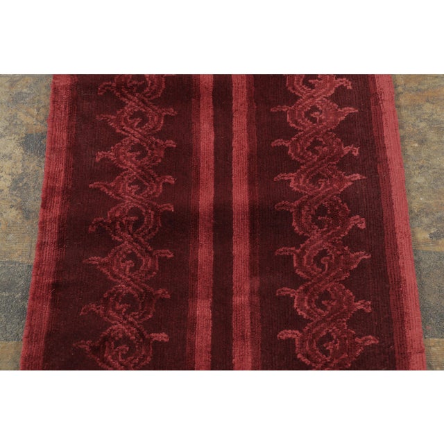 Hand-knotted in wool and natural silk, this 2x8 modern Nepalese runner is a refined expression of contemporary Himalayan...