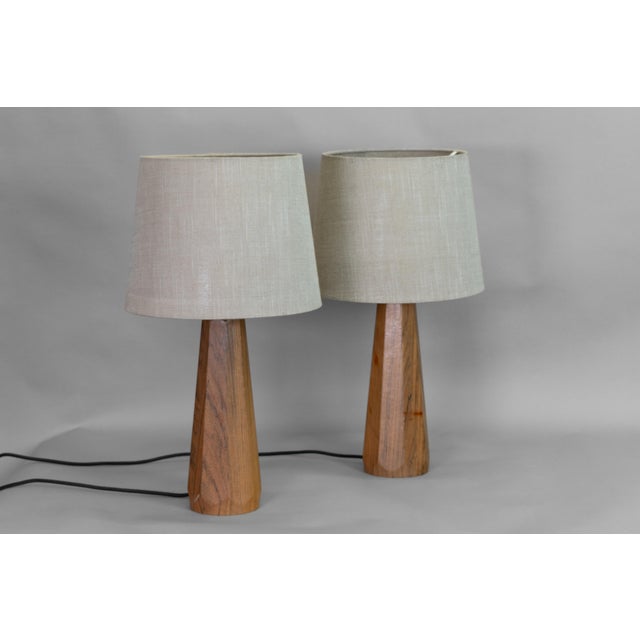 Pair of mid-century teak table lamps. Re-wired and tested. Shades not included. Sweden circa 1970. UK Plug (up to...