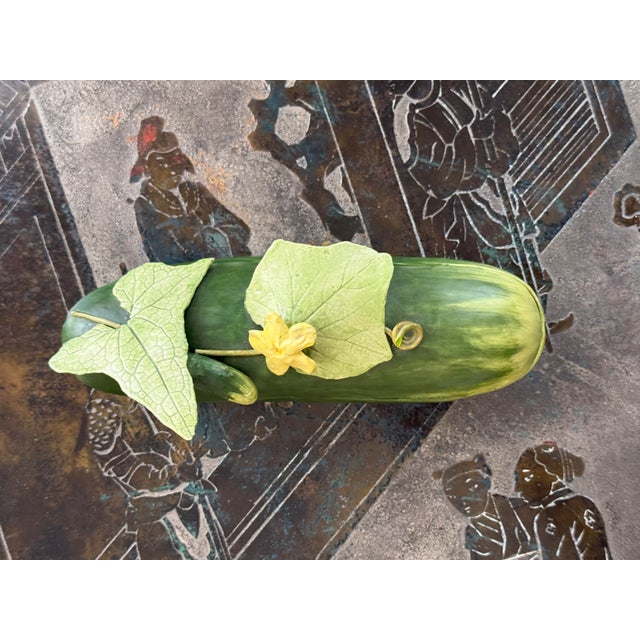 Mary Kirk Kelly fine porcelain zucchini box. Green with leaves and yellow flower. Signed and numbered on the interior.