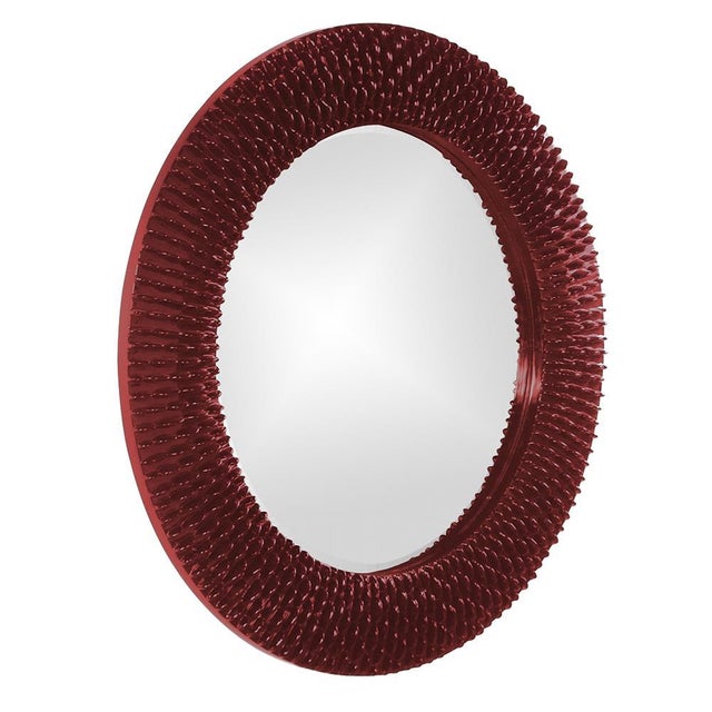 Bergman features a round frame characterized by a textured ribbed frame. It is then painted with our custom glossy...