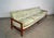 1960's Midcentury Danish Modern couch for sale. It's a really long sofa, and was reupholstered in 2015. It has a solid...