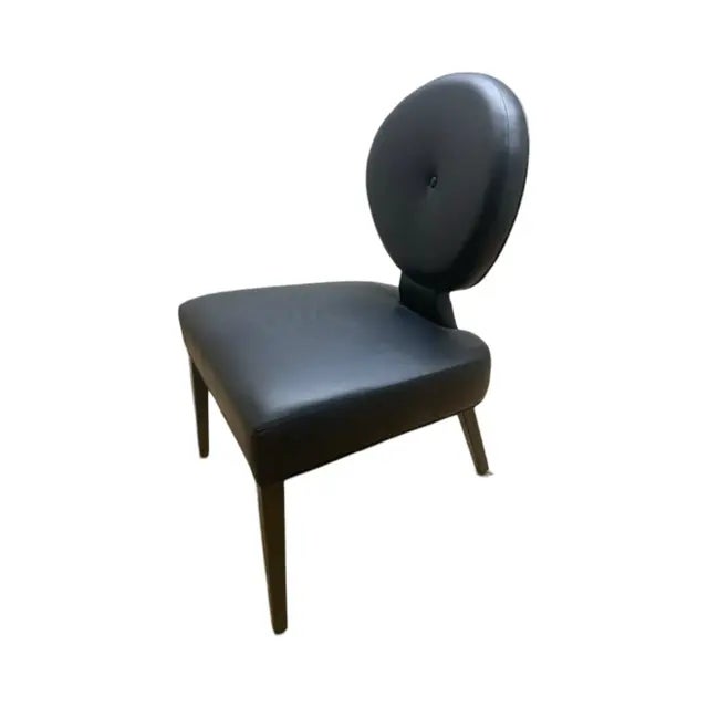 The Pearl chair Attributed to Brueton is a comfortable modern chair constructed of a hardwood frame and plywood with...