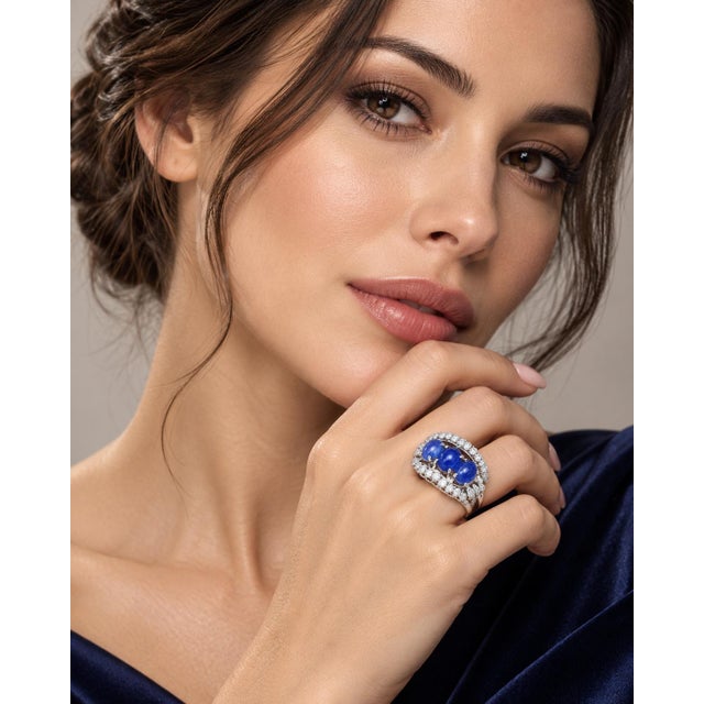 An authentic and striking vintage fine jewelry cocktail ring crafted in solid 14k white gold. Centering a dramatic three-...