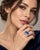 An authentic and striking vintage fine jewelry cocktail ring crafted in solid 14k white gold. Centering a dramatic three-...