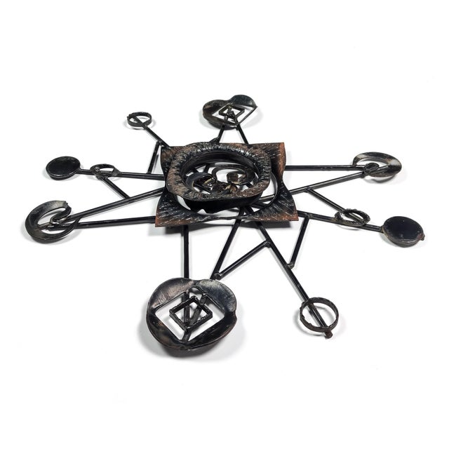 A large vintage danish abstract wall-mounted sculpture, in the manner of henrik horst, made of torch-cut and welded steel...