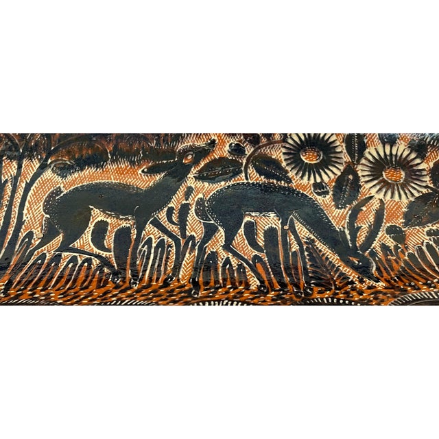 Large hand-painted piece of Tlaquepaque pottery. This unique large, long serving bowl, has a smooth glaze and features...