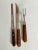 Vintage set of 3 wood handle stainless carving set and bread knife , makers mark reads " Wear- Ever Made in USA" They are...