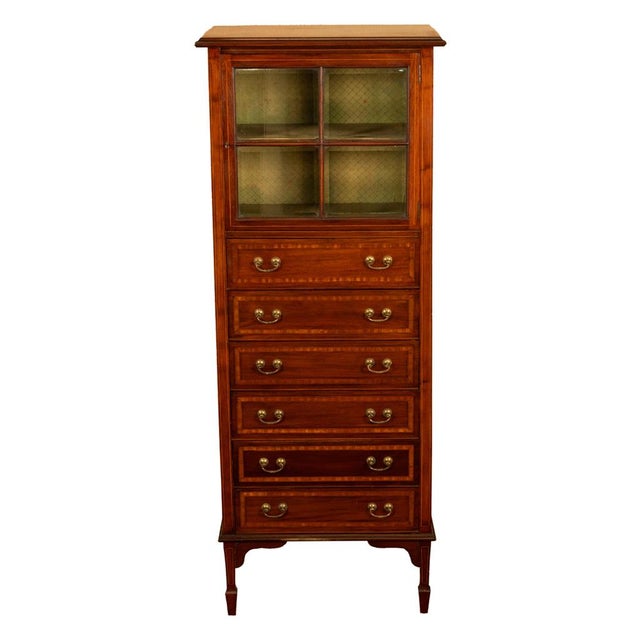A fine tall antique Sheraton Regency Revival inlaid mahogany music or filing cabinet, circa 1890. This very elegant...