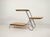 This elegant mid-century modern flower stand is a quintessential example of Czechoslovakian design from the 1960s, a...