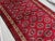Vintage Afghan Baluchi Red Rug With Ivory Border and Tribal Medallion Pattern Rug For Sale - Image 4 of 11