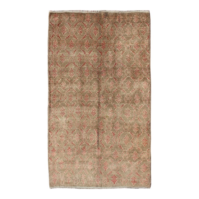 Vintage Turkish Tulu Rug With Repeating Coral Motifs on a Faded Brown Green Field For Sale