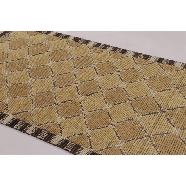 Made with hand-knotted wool, this 4x8 runner rug is an exceptional new addition to Rug & Kilim’s Scandinavian rug...