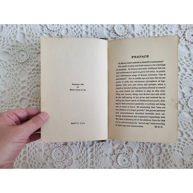 Games for All Occasions, copyright 1909. Featuring games for children and families of all ages. Measuring 7 ¾” x 5 ¼” x 1”...