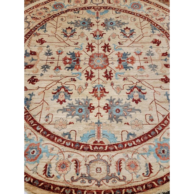 This stunning traditional constructed of wool pile on a wool foundation of warps and wefts is a Tabriz design, but its...