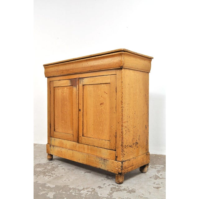 This old solid pine wardrobe has a beautiful, weathered appearance. It's full of character and history. Dating circa 1880,...