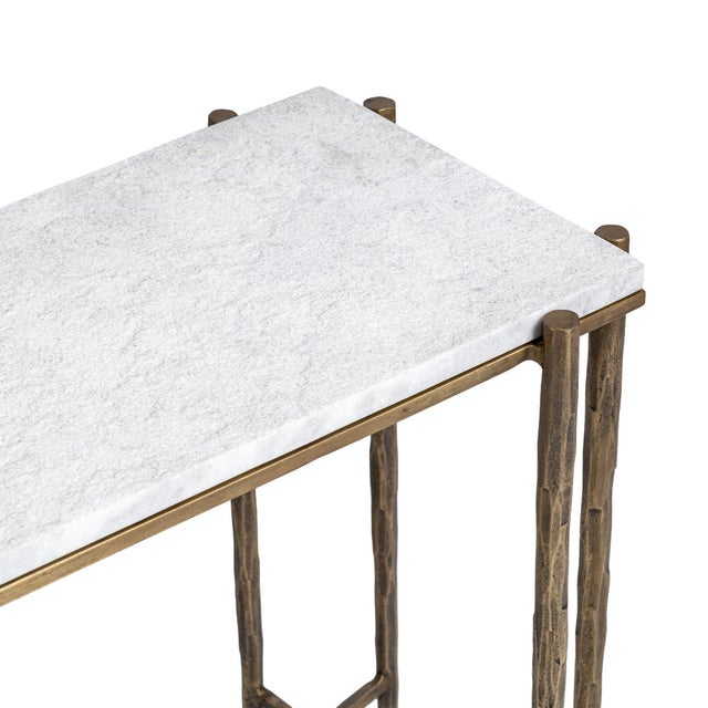 Beautiful white marble top console table. Hand hammered iron frame / legs with antiqued brass finish. Unique design with X...