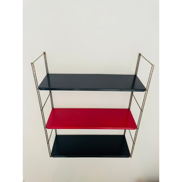 Vintage, mid-century, adjustable/ modular, brass and metal wall mount shelf, from the 1960's, in the style of "string"....