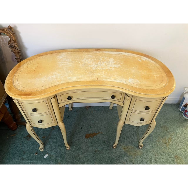 This antique-style furniture is a French Provincial kidney-shaped vanity or writing desk. Vintage, 19th century French...