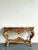 This grand antique Rococo console table is a breathtaking masterpiece of European artistry, epitomizing the drama and...
