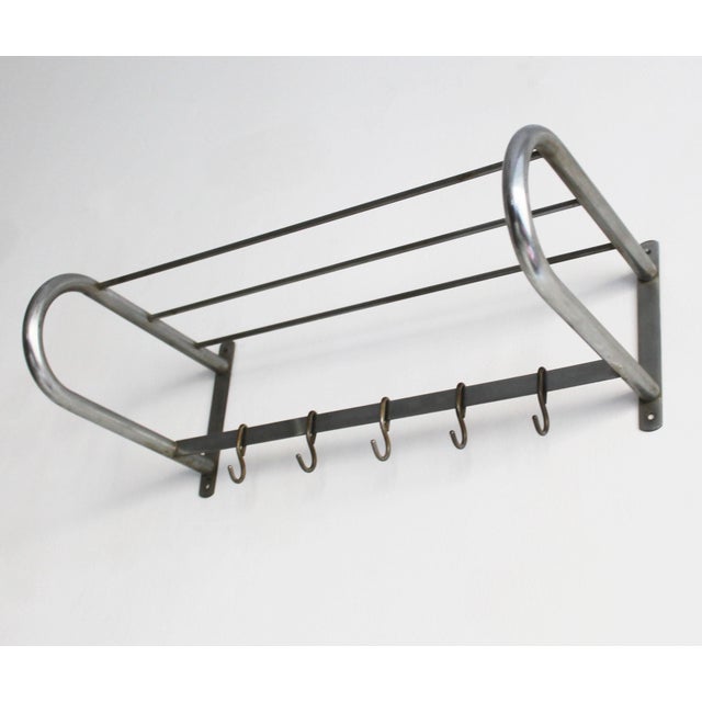 This coat rack was originally manufactured by Hynek Gottwald, one of the pioneers of metal furniture production in...