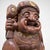 A large and expressive Japanese wooden statue of Daikoku, one of the Seven Lucky Gods, symbolising prosperity, wealth,...