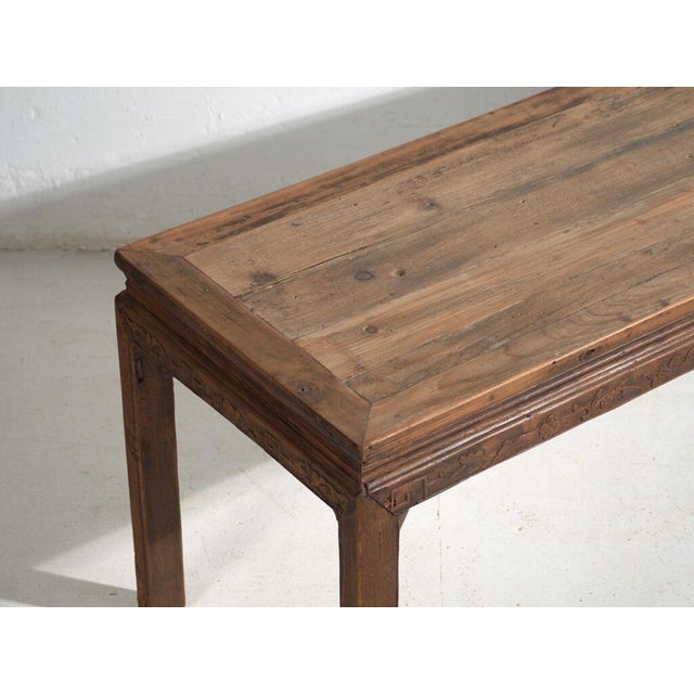 Antique long bench-table in pine wood, traditional chinese furniture originating from shandong and dated circa 1900....