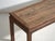 Antique long bench-table in pine wood, traditional chinese furniture originating from shandong and dated circa 1900....