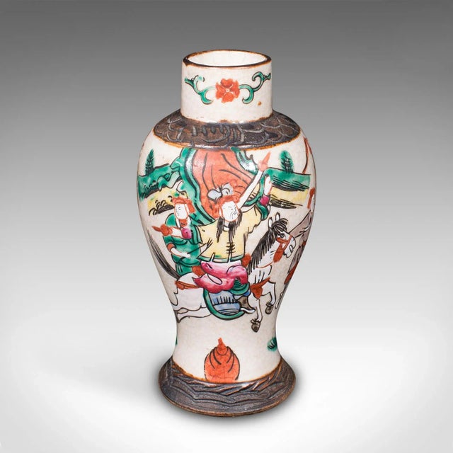This is a small antique posy vase. A Japanese, crackle glaze ceramic flower urn, dating to the late Victorian period,...