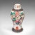 This is a small antique posy vase. A Japanese, crackle glaze ceramic flower urn, dating to the late Victorian period,...