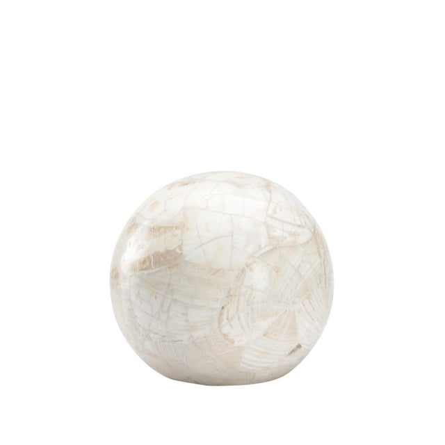 Sculpted from a pearly white stone quarried in the Philippines, the Neva Object is a large-scale decorative accessory...