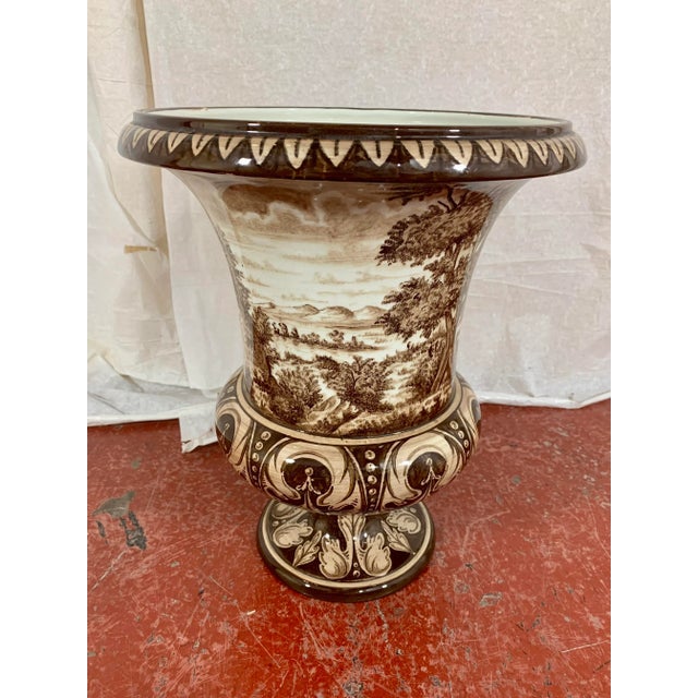 I just love this hand painted Medici Vase by the French company Gien. The delicate, romantic scenery is done in browns and...