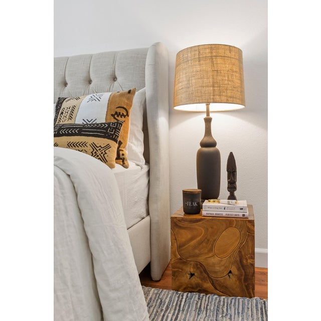 Vintage mudcloth made into a new throw pillow, backed in linen. A graphic pop for your living room or bedroom. Plays well...