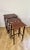 Nest of three antique Edwardian quality mahogany inlaid tables having a quality mahogany rectangular shaped top with...