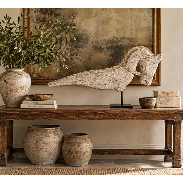 Make a commanding architectural statement with this monumental 45-inch hand-carved wooden horse sculpture. Featuring a...