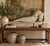 Make a commanding architectural statement with this monumental 45-inch hand-carved wooden horse sculpture. Featuring a...