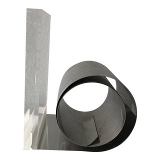 Acrylic and Brushed Steel Roll, Expandable Bookend For Sale