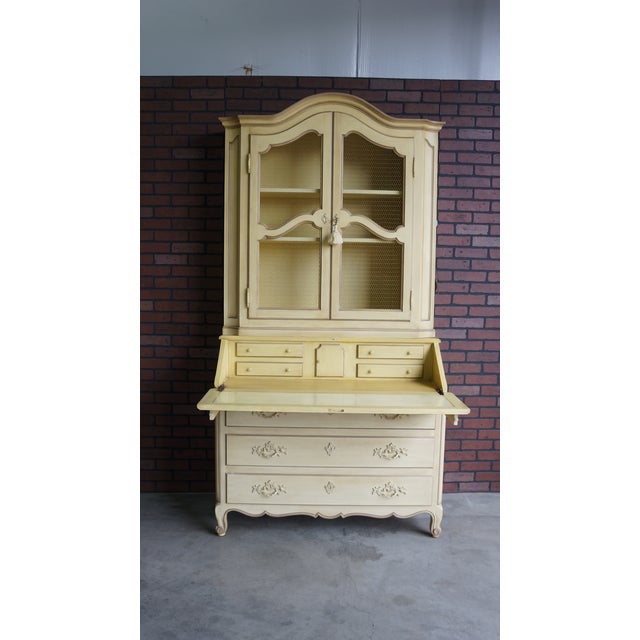 Parisian elegance, this Baker Furniture secretary desk exudes graceful and romantic vintage charm . The doors feature...