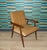 Iconic armchair Easy chair with a timelessly understated cover Cool style, modern look Beautifully shaped wooden frame in...