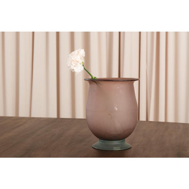 A frosted glass vase in the Scavo manner, where the surface is matte and slightly pitted to look like glass dug from an...