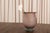 A frosted glass vase in the Scavo manner, where the surface is matte and slightly pitted to look like glass dug from an...