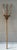 This antique American wooden hay fork features three elegantly arched tines rising from a long, hand-hewn shaft....