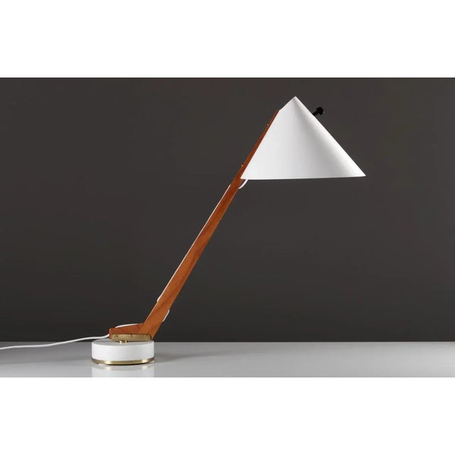 This vintage desk lamp was designed by Hans-Agne Jakobsson during the 1950s and produced by Markaryd in Sweden. It is made...