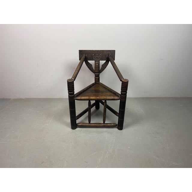 A rare and highly sculptural Ethiopian Gurage chieftain’s chair, hand-carved in hardwood and dating to circa the 1930s....