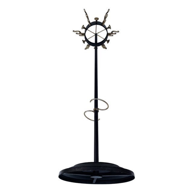 Mid-Century Modern Brass and Black Metal Coat Stand in the style of Jacques Adnet, 1950s For Sale