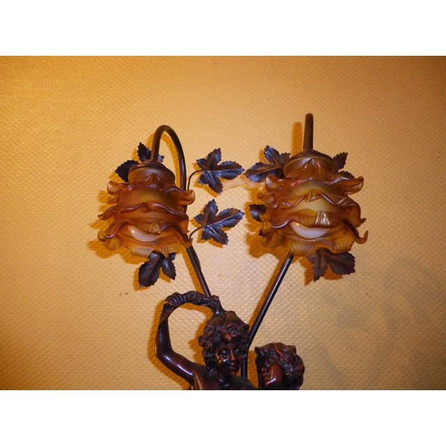 Art Nouveau Putti (Cupid) lamp, 75 cm high, in the style of Aug. Moreau (unsigned), circa 1900. The sculpture consists of...