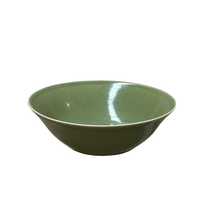 Discover the serene beauty and timeless charm of this exquisite handcrafted ceramic bowl, boasting a rich, inviting...
